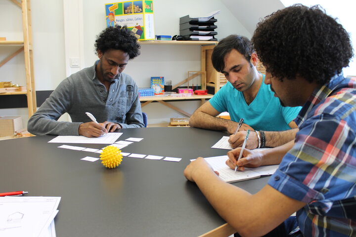 Flüchtlinge beim Sprachkurs